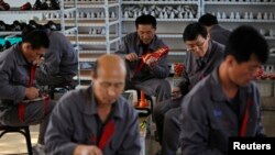 资料照片:在丹东工作的朝鲜劳工