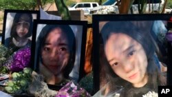 2018年6月11日,在亚利桑那州坦培市的一次纪念活动中,有江玥的大照片。