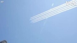 ဂျပန်လေယာဉ်အလှပျံအဖွဲ့ အိုလံပစ်အားကစားကွင်းပေါ် ပျံသန်း ဂျပန်လေယာဉ်အလှပျံအဖွဲ့ အိုလံပစ်အားကစားကွင်းပေါ် ပျံသန်း