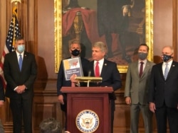 资料照片:众议院外交事务委员会首席共和党成员、中国工作组主席麦考尔出席中国工作组报告发布记者会。(2020年9月30日)