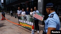 Người dân biểu tình phản đối Nhật Bản xả nước nhiễm phóng xạ đã qua xử lý xuống biển ở Hong Kong