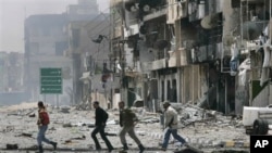 利比亚反政府武装周六在被围攻的米苏拉塔