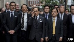 资料照：香港大律师公会成员和法律界人士游行前往中联办反对港府计划批准送中法案。（2019年6月6日）