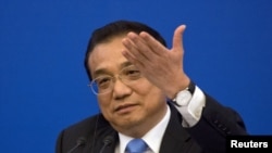 中国总理李克强在北京人大会堂召开的中欧企业家圆桌会议上讲话。(2018年7月16日)