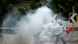 အရေးပေါ်ဥပဒေကို အာခံတဲ့ မျက်နှာဖုံးတပ် ဟောင်ကောင်ဆန္ဒပြပွဲ အရေးပေါ်ဥပဒေကို အာခံတဲ့ မျက်နှာဖုံးတပ် ဟောင်ကောင်ဆန္ဒပြပွဲ