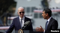 英国首相里希·苏纳克(Rishi Sunak,右)2023年3月13日在美国圣迭戈海军基地与美、澳领导人推进实施奥库斯联盟AUKUS协议。(路透社)