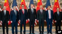美中两国的贸易谈判代表在北京钓鱼台国宾馆合影。(2019年3月29日)