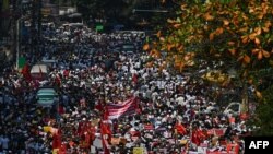 ရန်ကုန်မြို့တွင်စစ်အာဏာသိမ်းမှုကိုဆန့်ကျင်ဆန္ဒပြခဲ့စဉ် ( ဖေဖော်ဝါရီ-၂၂ )(Photo by Ye Aung THU / AFP)