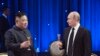 Russian President Vladimir Putin, right, toasts with North Korea's leader Kim Jong Un after their talks in Vladivostok, Russia, April 25, 2019. 