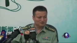 中国军方重申南中国海立场:猎枪迎豺狼