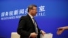 中国商务部副部长王受文在介绍《关于中美经贸磋商的中方立场》白皮书的记者会之后离开会场(2019年6月2日)