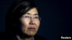 中国维权律师王宇2014年3月1日在北京接受路透社采访时讲话。