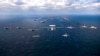美国海军航空母舰卡尔·文森与亚伯拉罕·林肯号两艘航母的战斗群在菲律宾海航行。(2022年1月22日)