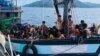 Langkawi ကျွန်းရှိ မလေးရှားပိုင်နက်အတွင်းမှာ တွေ့ရတဲ့ လှေစီးပြေး ရိုဟင်ဂျာတချို့ (ဓာတ်ပုံ - AFP PHOTO / MALAYSIAN MARITIME ENFORCEMENT AGENCY)