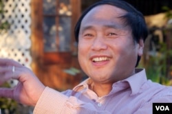 中国民主党全国委员会主席王军涛(2013年12月25日,美国之音国符拍摄)