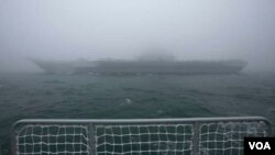 2019年4月23日,中国海军的“辽宁号”航母在青岛海域参加纪念海军成立70周年的海上阅兵仪式。