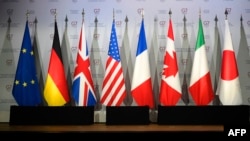 资料图:七国集团各成员国和欧盟旗帜。