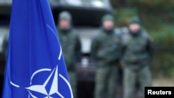 资料照:北约的“增强前沿驻军”战斗组在拉脱维亚举行军演。(路透社2019年10月5日)