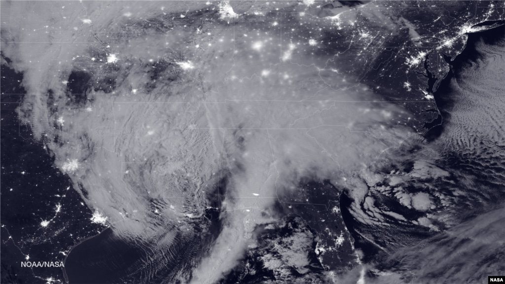 NASA and NOAA satellites are tracking the large winter storm that is expected to bring heavy snowfall to the U.S. mid-Atlantic region on Jan. 22-23. NASA-NOAA's Suomi NPP satellite snapped this image of the approaching blizzard around 2:35 a.m. EST, Jan. 22, 2016.