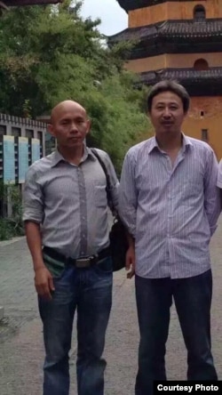 南方街头运动人士谢文飞(左)王默(网络图片 )