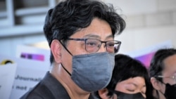 香港记者协会主席杨健兴表示,警方拘捕蔡玉玲是错误的决定,律政司正式检控, 是一错再错,法院裁定她罪名成立,是错上加错,形容是传媒黑暗的一日 (美国之音/汤惠芸)