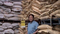 资料照:中国河北养猪农民孙大午在饲料仓库里 (2019年9月24日)