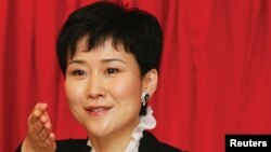 中国前总理李鹏的女儿李小琳参加记者会(2014年1月22日)