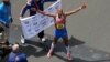 Meb Keflezighi of the United States celebrates after winning the 2014 Boston Marathon, April 21, 2014. (Credit: Greg M. Cooper-USA TODAY Sports)
