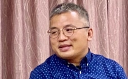 香港记者协会主席陈朗升表示,国安法实施后有香港新闻工作者被检控,他认为某些方面香港的新闻工作环境可能比中国大陆更差,担心《基本法》对新闻自由的保障不够全面 (美国之/音汤惠芸)