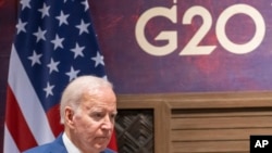 资料照片:2022年11月14日,拜登总统在印度尼西亚巴厘岛举行的 G20 峰会期间的一场活动上。(美联社照片)