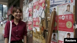 资料照:获得保释的其中一名被告,香港湾仔取区议会主席杨雪盈 (2015年11月23日)