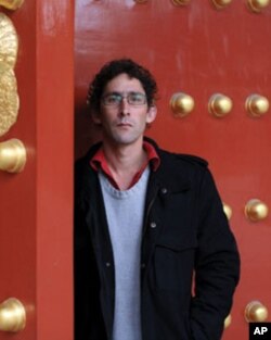 中国媒体观察人士金玉米