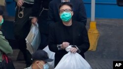 谭得志(中)资料照片