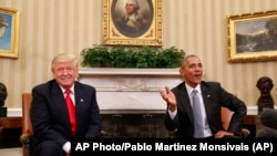 在撕裂式的选战之后,奥巴马总统与当选总统川普在白宫友好会面。(2016年11月10日)