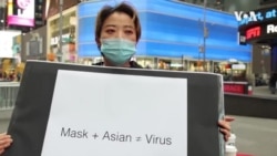 中国留学生时报广场发口罩,反歧视 中国留学生时报广场发口罩,反歧视