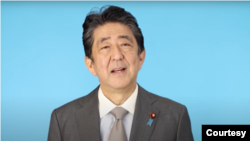 日本前首相安倍晋三2021年12月14日通过视讯在台湾远景基金会对话会上讲话(远景基金会视讯截屏)