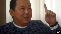 前汉龙集团董事长、四川富豪刘汉(2011年1月16日资料照)