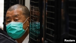 资料照片:黎智英2021年2月9日乘囚车抵达香港终审法院(路透社照片)