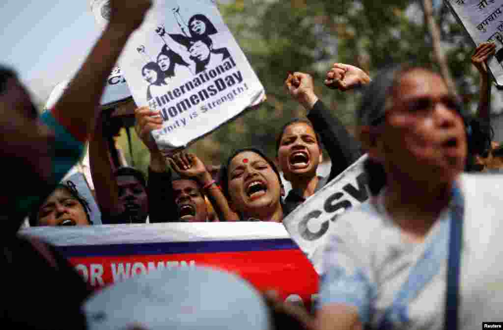 Girls shout slogans during a protest demanding equal rights for women on the occasion of International Women’s Day in New Delhi, India, March 8, 2018.