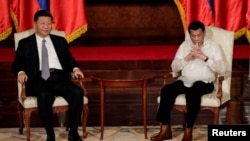 中国国家主席习近平与菲律宾总统杜特尔特2018年11月20日在菲律宾马尼拉举行会晤。(路透社)