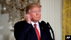 在白宫与日本首相安倍晋三联合举办记者会的美国总统川普。(2017年2月10日)