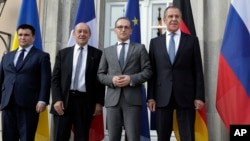 ယခင်မှတ်တမ်းဓါတ်ပုံ June 11, 2018. (AP Photo/Michael Sohn)