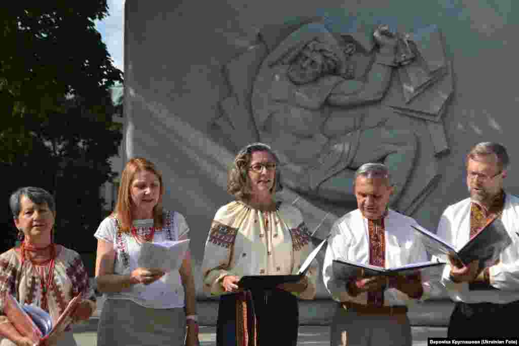 Muslim Khaloar Abdarahim holds a placard which reads "Not in my name" as he poses inside the Arrahma Mosque after Friday prayers in Nantes, western France after a gathering to pay tribute to French mountain guide Herve Gourdel. Thousands of French Muslims rallied across the country to protest the Islamic State, which many say does not represent their religion.