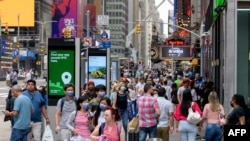 资料图片:美国纽约时报广场。(2021年7月13日)