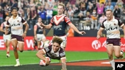 巴布亚新几内亚将从2028年起加入澳大利亚国家橄榄球联盟比赛;该联盟今年开幕赛移师美国拉斯维加斯,展现进军海外企图心。(美联社:2024年3月2日)