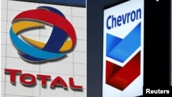 Total နဲ့ Chevron  ကမ္ဘာ့ရေနံကုမ္ပဏီကြီး ၂ ခု (PHOTO: REUTERS)