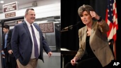 爱奥华(Iowa)州的共和党籍联邦女参议员乔尼•恩斯特(Joni Ernst 右)和蒙大拿州的民主党联邦参议员乔恩•泰斯特(Jon Tester)