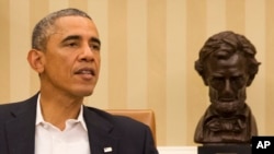President Barack Obama meets in the Oval Office of the White House with members of his public health and national security team about the response to the diagnosis of a second Ebola case in Dallas, Texas, Oct. 13, 2014
