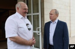 资料照:俄罗斯总统普京在索契会见到访的白俄罗斯总统卢卡申科。(2023年6月9日)