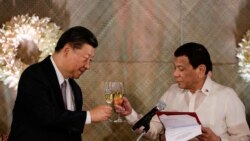 中国国家主席习近平和菲律宾总统杜特尔特在马尼拉总统府举行的国宴上(路透社2018年11月20日)
